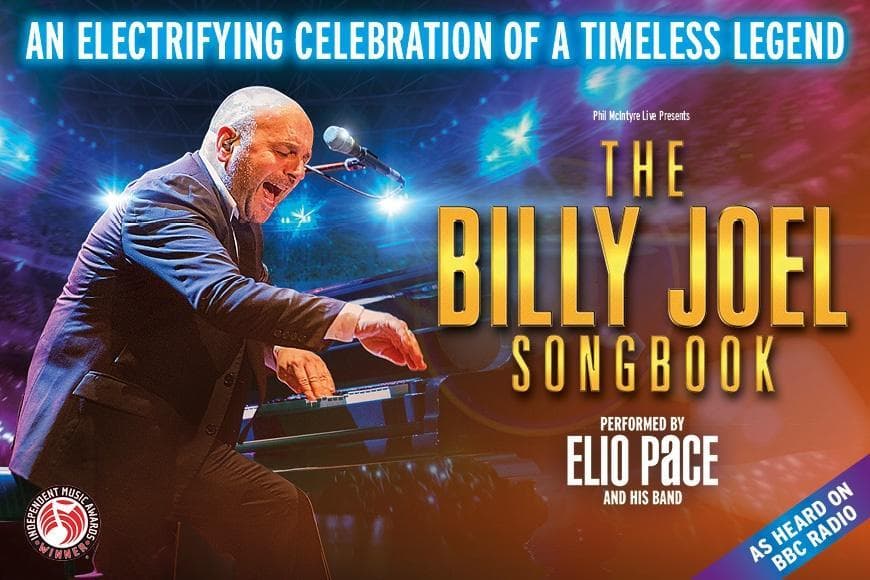 Man playing piano and singing