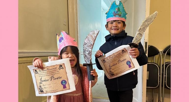 Young boy and girl dressed as pirates